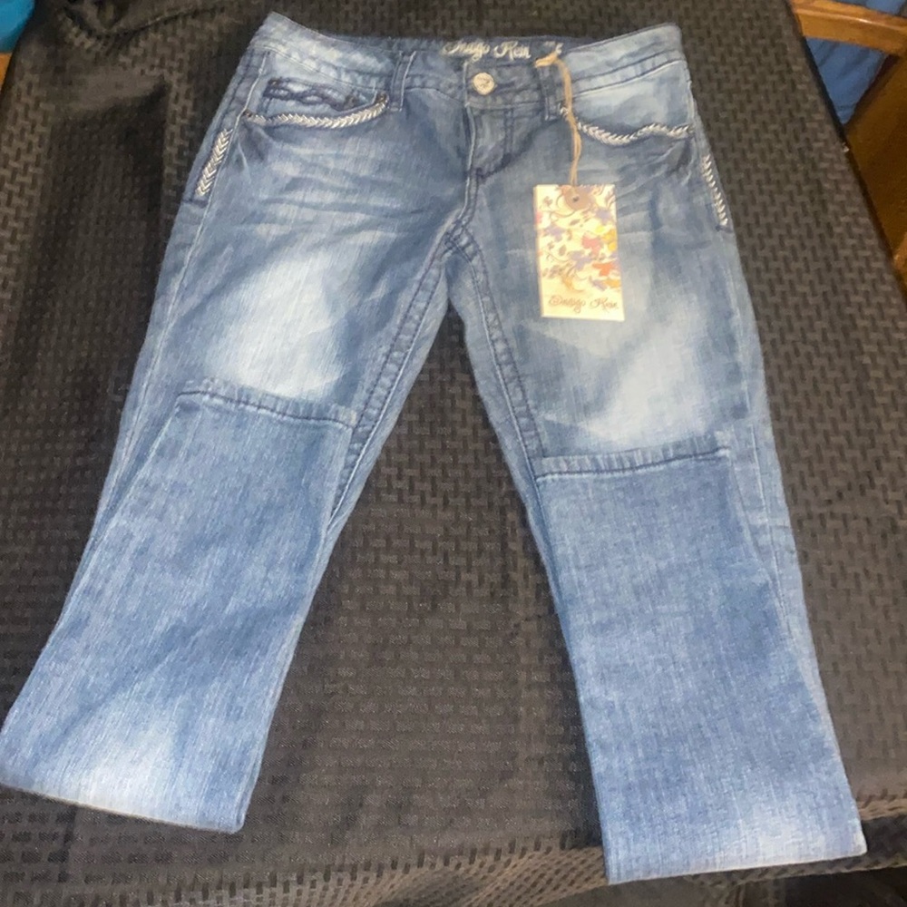 These are brand new jeans, worn once just to try on.